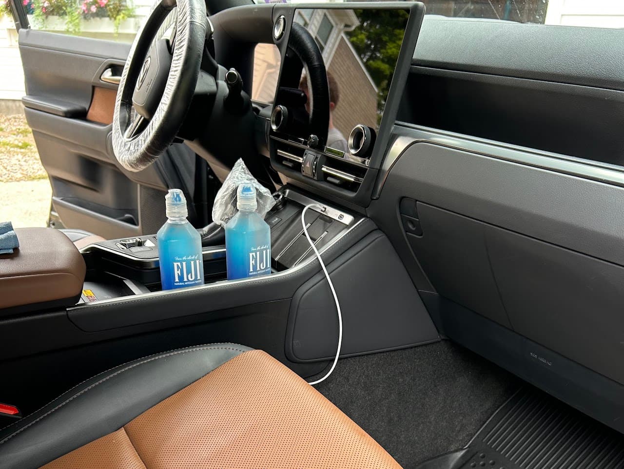 Cleaned tan leather interior with console and screen